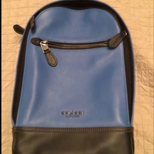 Coach, one strap backpack